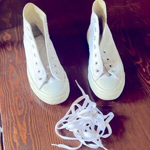 Converse All Star leather high tops.